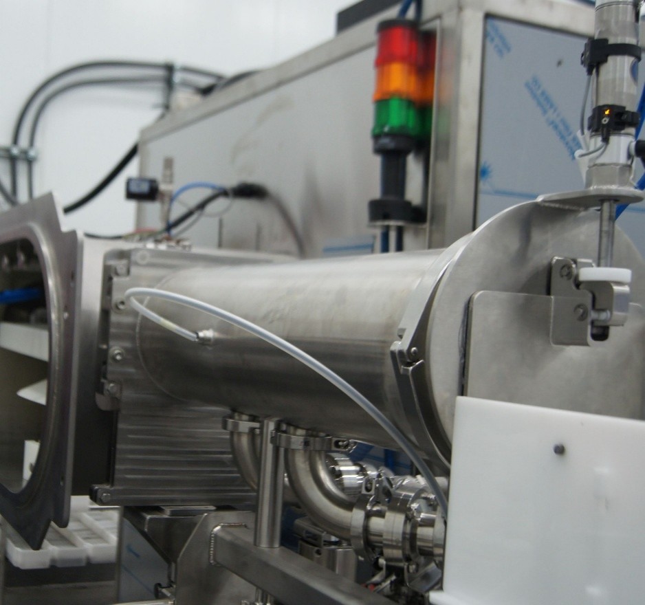 Photo of NuWave Research's industrial microwave machine that utilizes microwave technology.